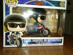 57 Carol Danvers on Motorcycle