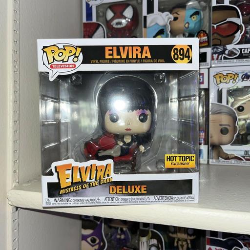 894 Elvira (on Red Sofa) (Deluxe) (Hot Topic)